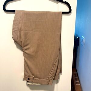 Barney’s thin tan striped suit never worn